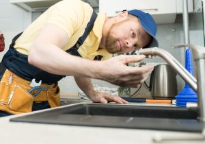 Why Is My Faucet Still Running When Turned Off? - HomeVib